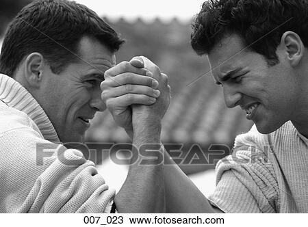 Stock Image - Men arm-wrestling. Fotosearch