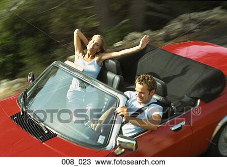 Couple in convertible View Large Photo Image Stock Image - Couple in convertible. Fotosearch