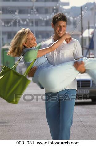Couple in the street View Large Photo Image Stock Image - Couple in the street. Fotosearch