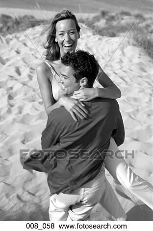 Couple on beach View Large Photo Image Stock Photo - Couple on beach. Fotosearch