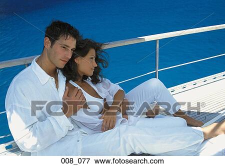 Couple on sailing boat View Large Photo Image Stock Photo - Couple on sailing boat. Fotosearch