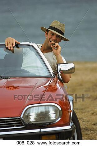 Stock Photo - Man in convertible. Fotosearch