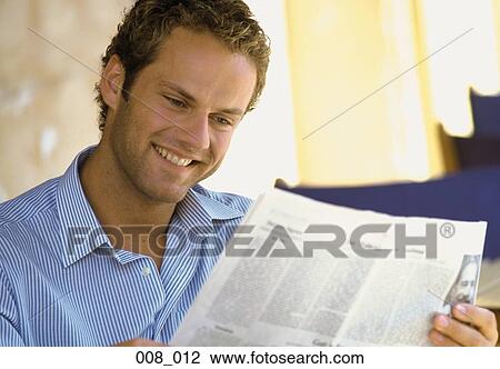 Man reading newspaper View Large Photo Image Stock Image - Man reading newspaper. Fotosearch
