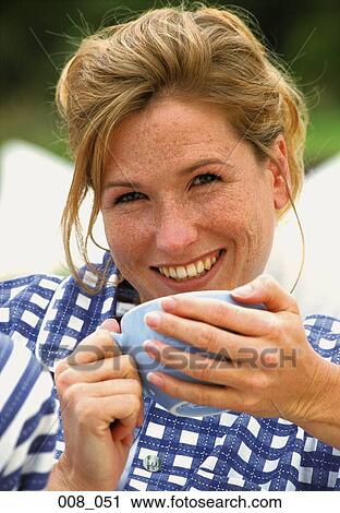 Woman drinking tea View Large Photo Image Stock Image - Woman drinking tea. Fotosearch