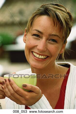 Woman drinking tea View Large Photo Image Stock Image - Woman drinking tea. Fotosearch