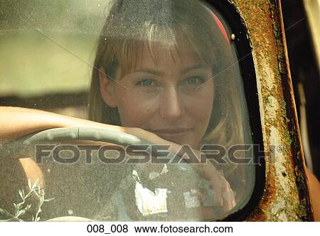 Stock Photo - Woman in car. Fotosearch