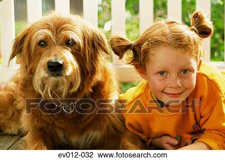 Stock Image - Girl and dog. Fotosearch