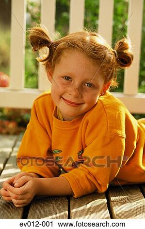 Stock Image - Girl with pigtails. Fotosearch