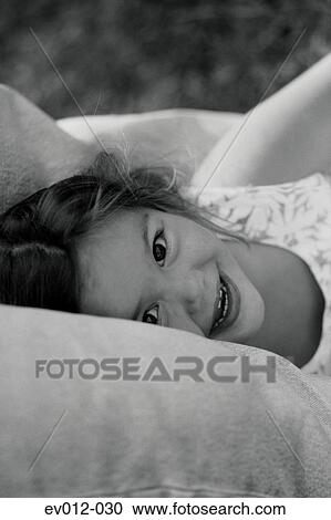 Stock Image - Shy girl. Fotosearch