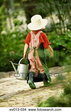 Girl gardening View Large Photo Image Picture - Girl gardening. Fotosearch