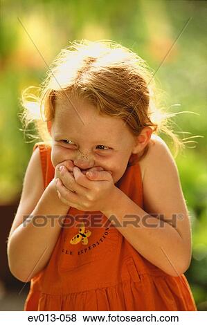 Stock Photo - Girl giggling. Fotosearch