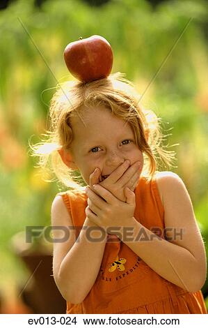Picture - Girl with apple. Fotosearch