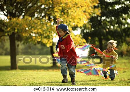 Kids with kite View Large Photo Image Picture - Kids with kite. Fotosearch