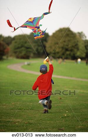 Kite flying View Large Photo Image Stock Image - Kite flying. Fotosearch
