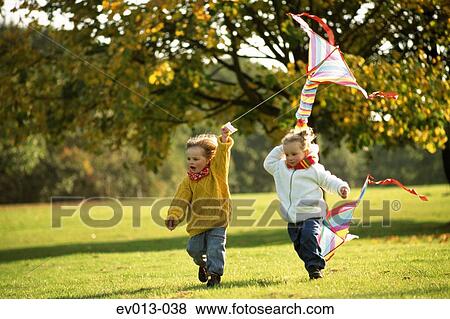 Kite flying View Large Photo Image Stock Photo - Kite flying. Fotosearch
