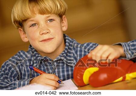 Boy at homework View Large Photo Image Stock Image - Boy at homework. Fotosearch