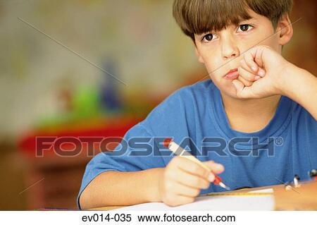 Boy at homework View Large Photo Image Stock Photography - Boy at homework. Fotosearch