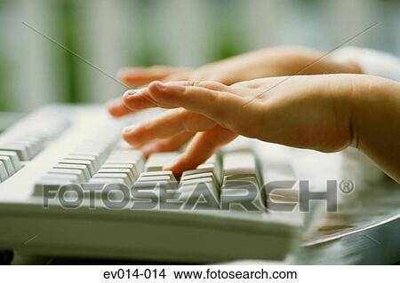Child typing View Large Photo Image Picture - Child typing. Fotosearch