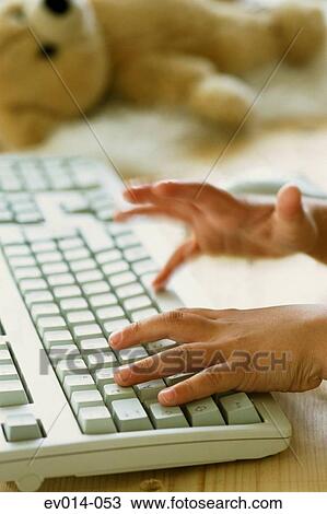 Child typing View Large Photo Image Stock Image - Child typing. Fotosearch