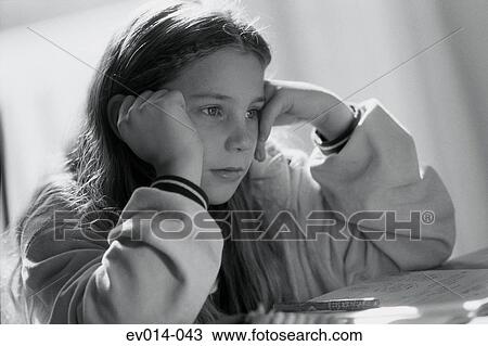 Stock Image - Girl studying. Fotosearch