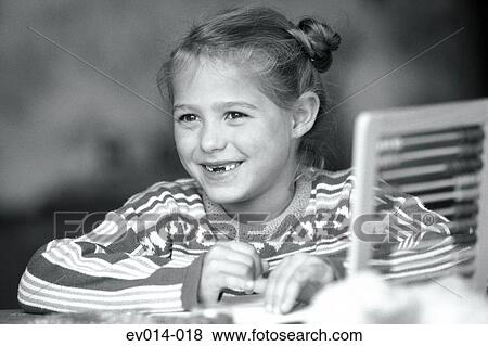 Stock Photo - Girl studying. Fotosearch