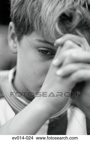 Picture - Pensive boy. Fotosearch