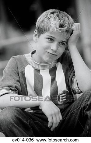 Stock Photograph - Pensive boy. Fotosearch