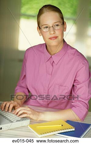 Girl at laptop View Large Photo Image Stock Photography - Girl at laptop. Fotosearch