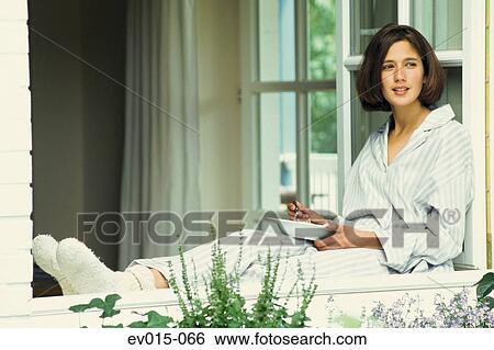 Girl at window View Large Photo Image Stock Photograph - Girl at window. Fotosearch