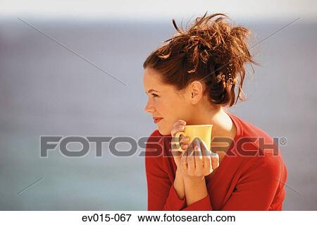 Stock Photo - Girl drinking coffee. Fotosearch