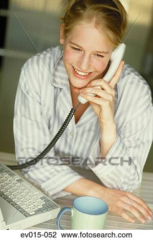 Stock Image - Girl on phone. Fotosearch