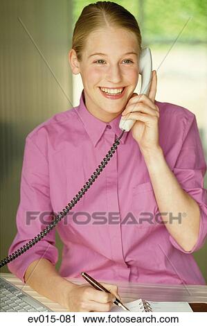 Stock Image - Girl on phone. Fotosearch