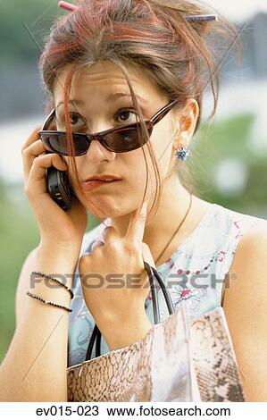 Girl with mobile phone View Large Photo Image Stock Image - Girl with mobile phone. Fotosearch