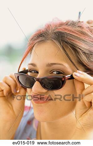 Stock Photo - Girl with sunglasses. Fotosearch