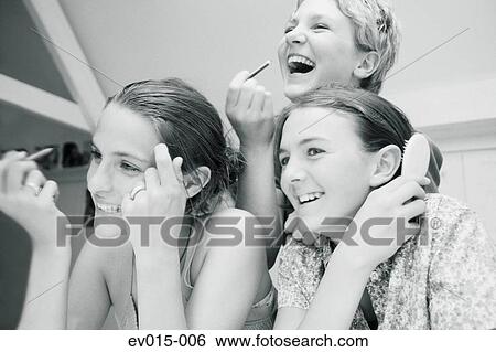 Girls and make-up View Large Photo Image Stock Photograph - Girls and make-up. Fotosearch