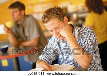 Man in café View Large Photo Image Stock Image - Man in café. Fotosearch