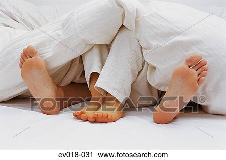 Big and little feet View Large Photo Image Stock Image - Big and little feet. Fotosearch