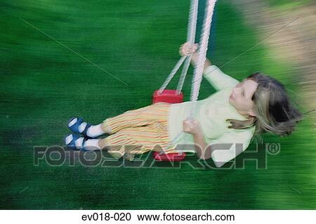 Stock Image - Girl on swing. Fotosearch
