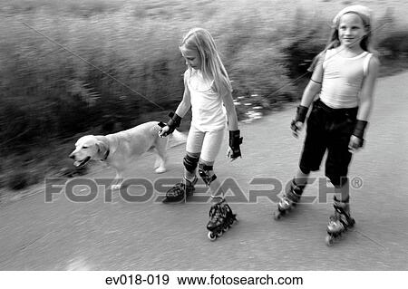 Stock Photo - Girls on roller-blades. Fotosearch
