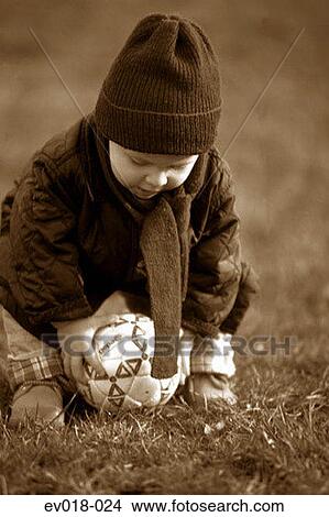 Toddler playing ball View Large Photo Image Picture - Toddler playing ball. Fotosearch