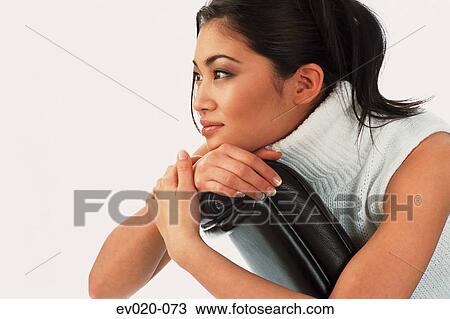 Girl leaning on chair View Large Photo Image Stock Image - Girl leaning on chair. Fotosearch