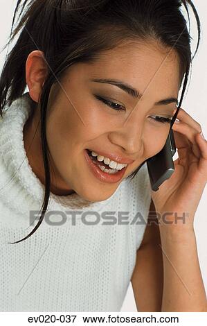 Girl talking on phone View Large Photo Image Stock Photo - Girl talking on phone. Fotosearch