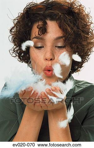 Girl with feathers View Large Photo Image Stock Image - Girl with feathers. Fotosearch