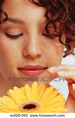 Girl with flower View Large Photo Image Stock Image - Girl with flower. Fotosearch