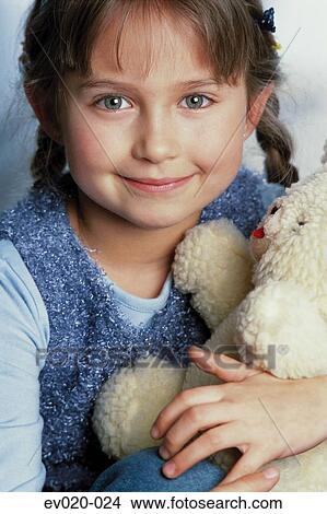 Girl with teddy View Large Photo Image Picture - Girl with teddy. Fotosearch