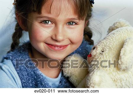 Girl with teddy View Large Photo Image Stock Image - Girl with teddy. Fotosearch