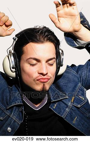 Man dancing to music View Large Photo Image Stock Photo - Man dancing to music. Fotosearch