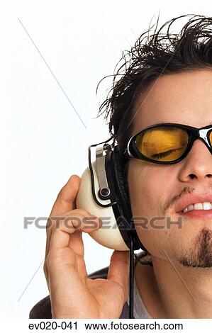 Man listening to music View Large Photo Image Stock Image - Man listening to music. Fotosearch