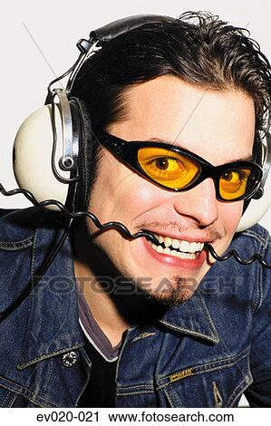 Man with headphones View Large Photo Image Stock Image - Man with headphones. Fotosearch
