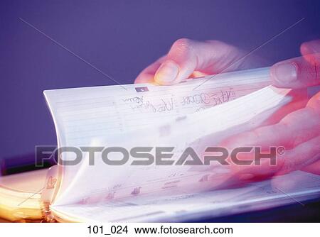 Checking the diary View Large Photo Image Picture - Checking the diary. Fotosearch